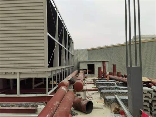 風(fēng)筒的漂流水對(duì)開式冷卻塔的影響